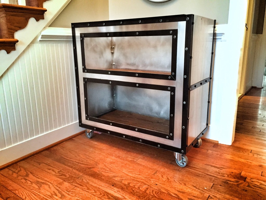 128 bolts. 256 holes drilled. 200 lbs of aluminum, steel, and pine. Maple butcher block top still to come!