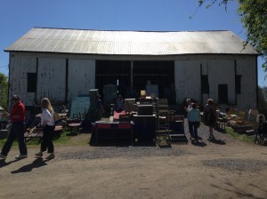 This giant barn is full of furniture -- many of which is unfinished or needs fixin' up -- awesome!
